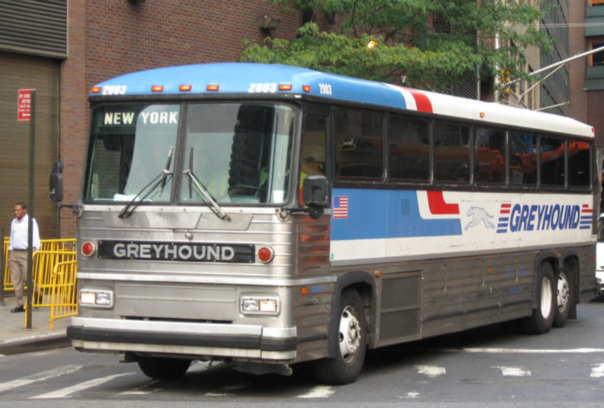 Greyhound leaves the Port Authority Bus Terminal.