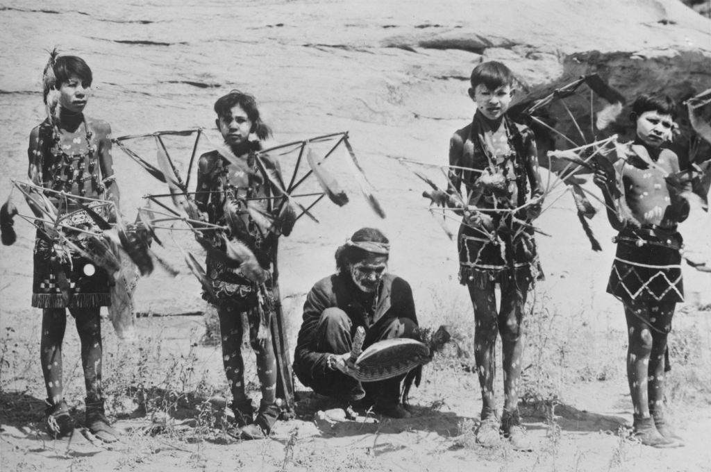 Native American Navajo medicine man and boys