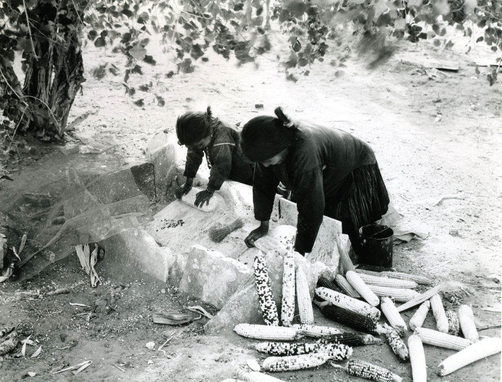 Navajo woman making food