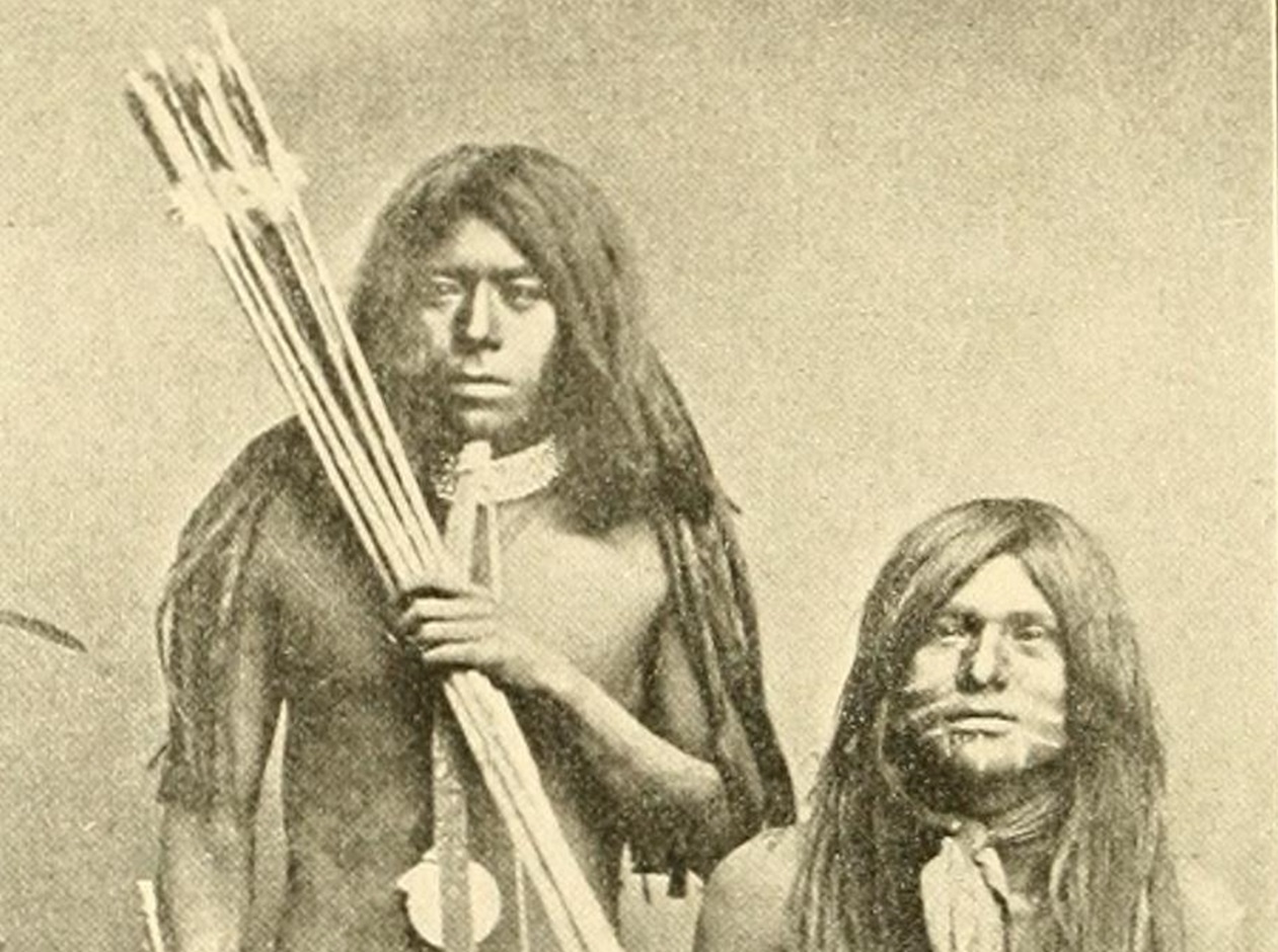 Comanche people with bow and arrow.