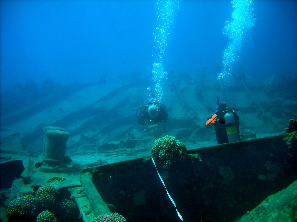 Archaeologists surveying the Japanese Merchant Vessel at the the Maritime Heritage Trail