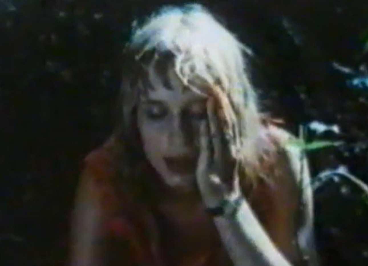 Screenshot of Susan Penhaligon as Juliane Koepcke looking sick - from Miracles Still Happen (1974)