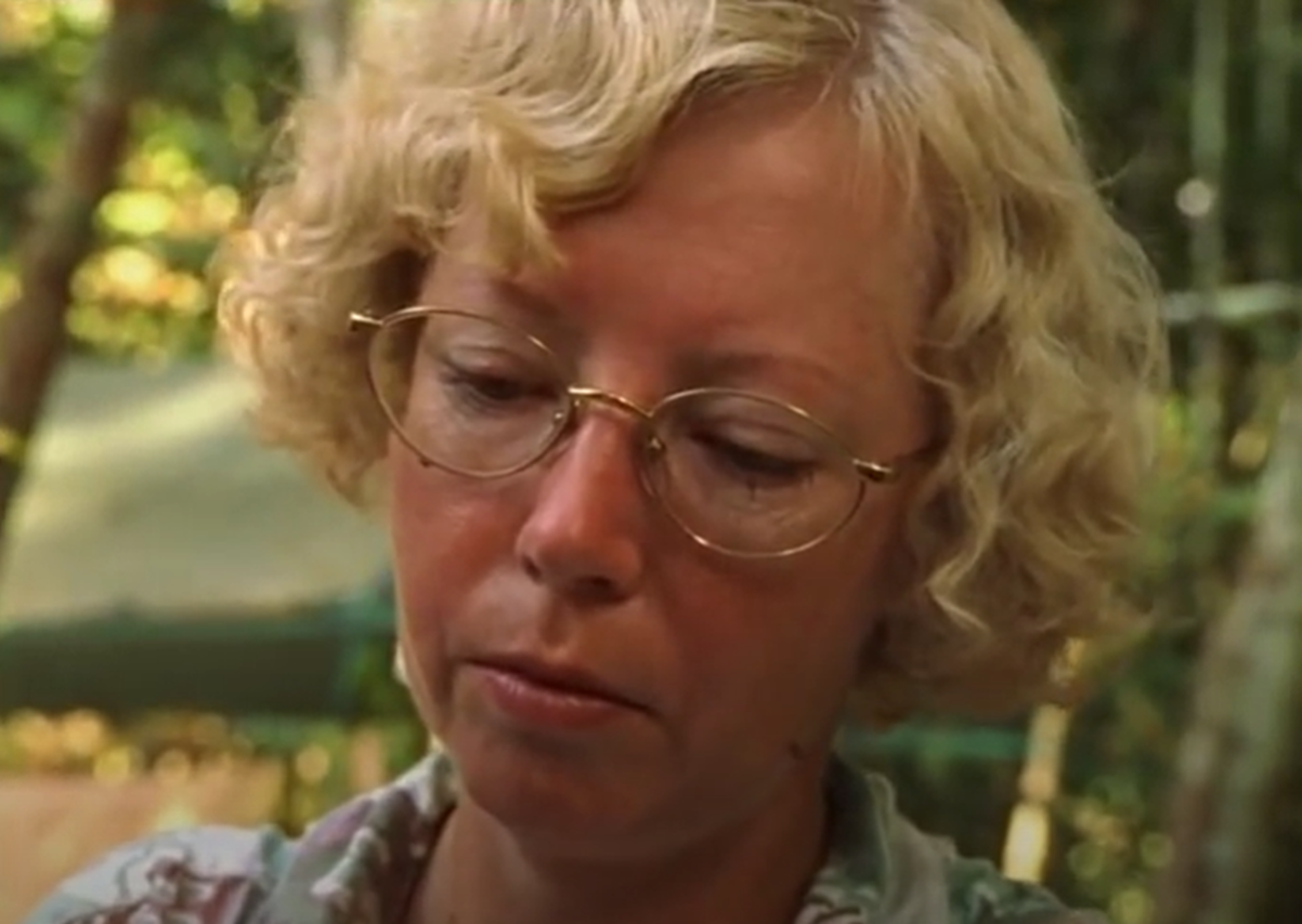 Screenshot of Juliane Koepcke looking down - from Julianes Sturz in den Dschungel (1999)