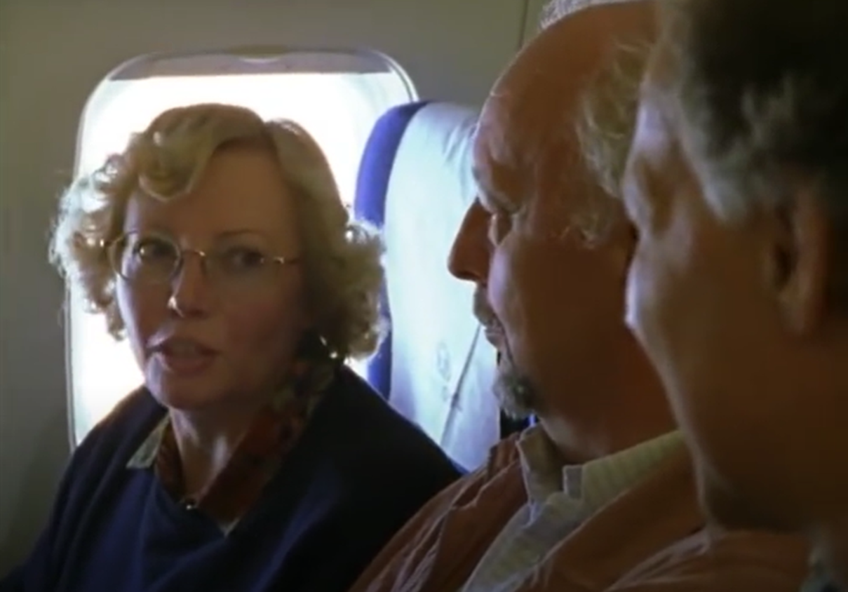 Screenshot of Juliane Koepcke on the plane with Werner Herzog - from Julianes Sturz in den Dschungel (1999)
