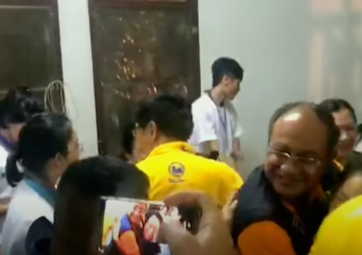 Screenshot of people outside the cave - from Thai Cave Rescue (Drain the Oceans) 2019