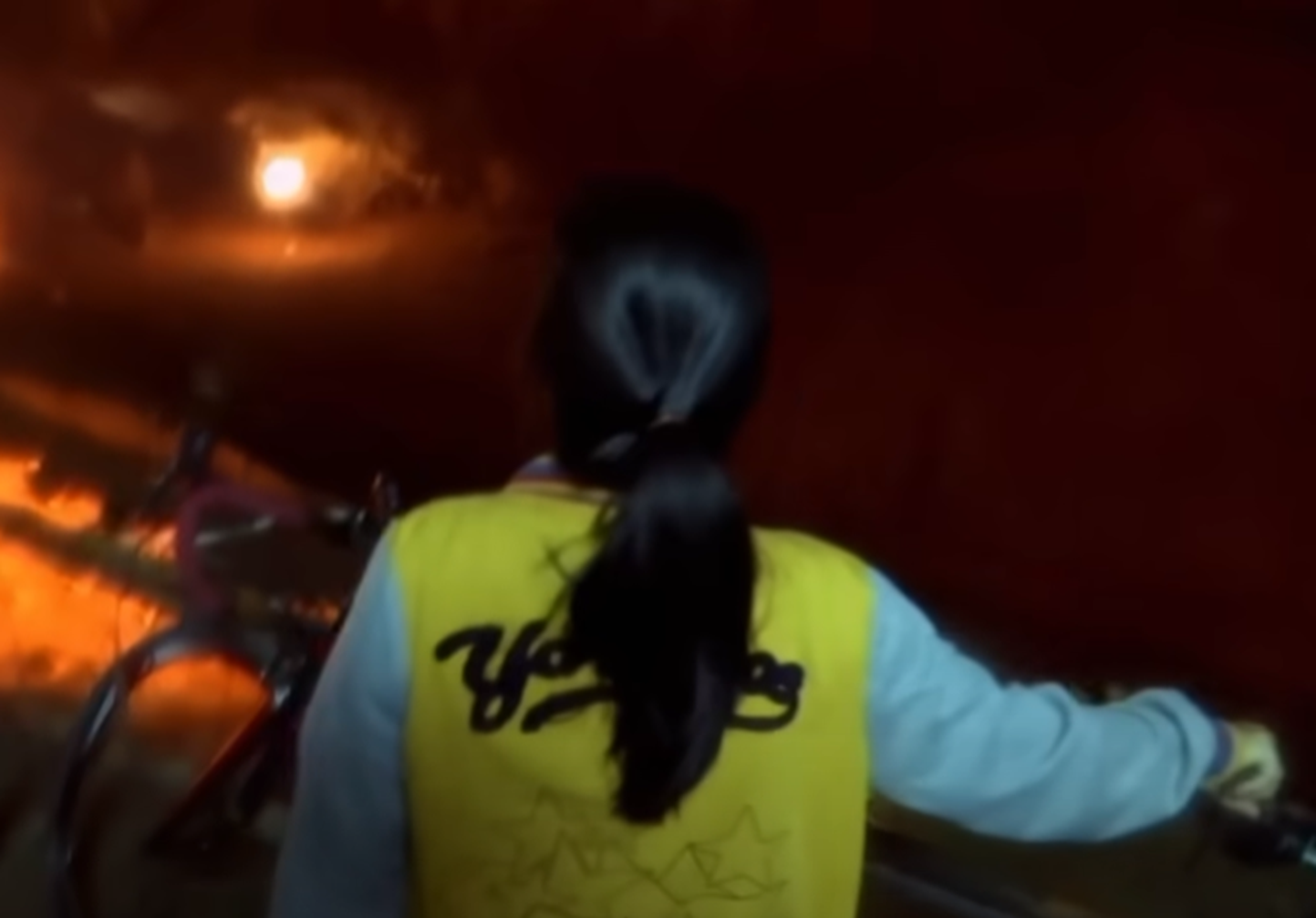 Screenshot of woman in the cave - from Thai Cave Rescue (Drain the Oceans) 2019