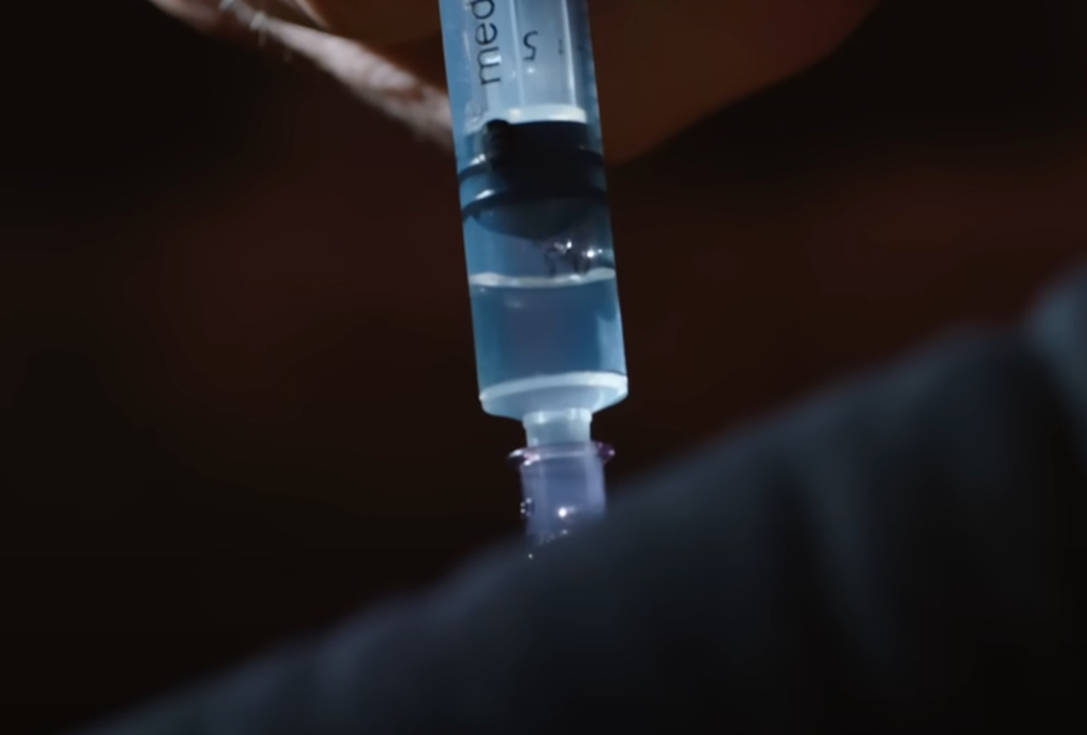 Screenshot of syringe - from Thai Cave Rescue (Drain the Oceans) 2019