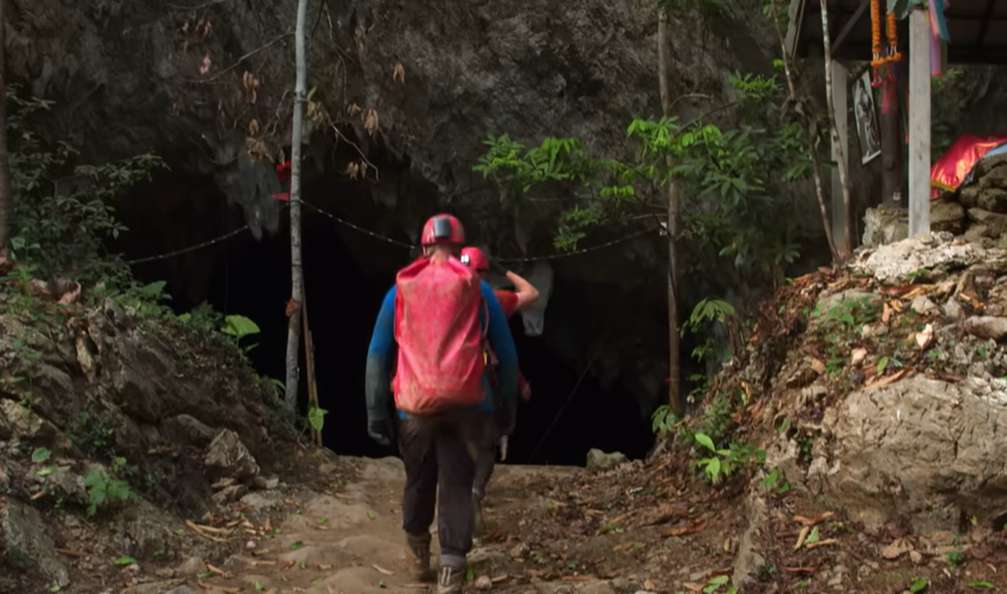 Screenshot of rescue divers in the cave - from Thai Cave Rescue (Drain the Oceans) 2019
