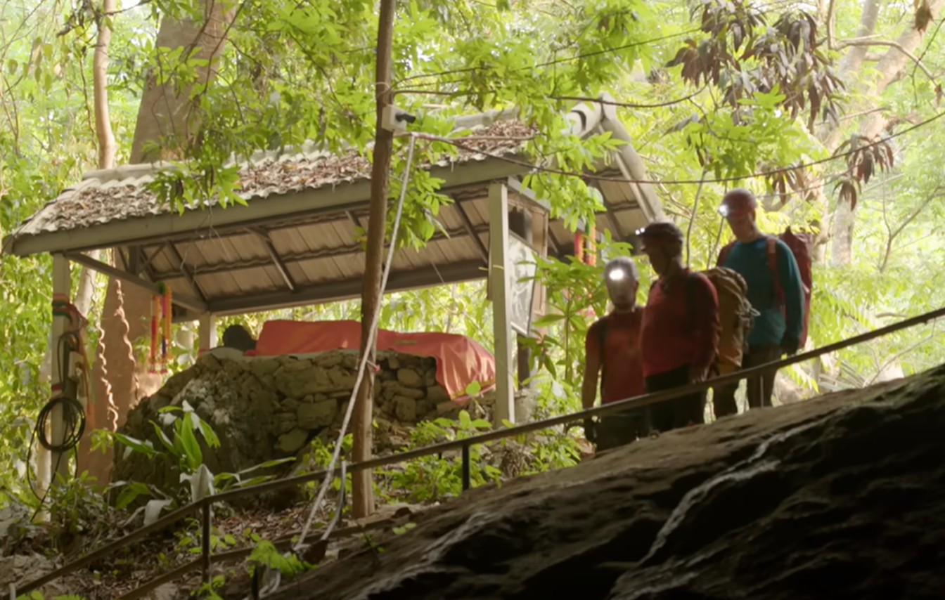 Screenshot of people outside the cave - from Thai Cave Rescue (Drain the Oceans) 2019