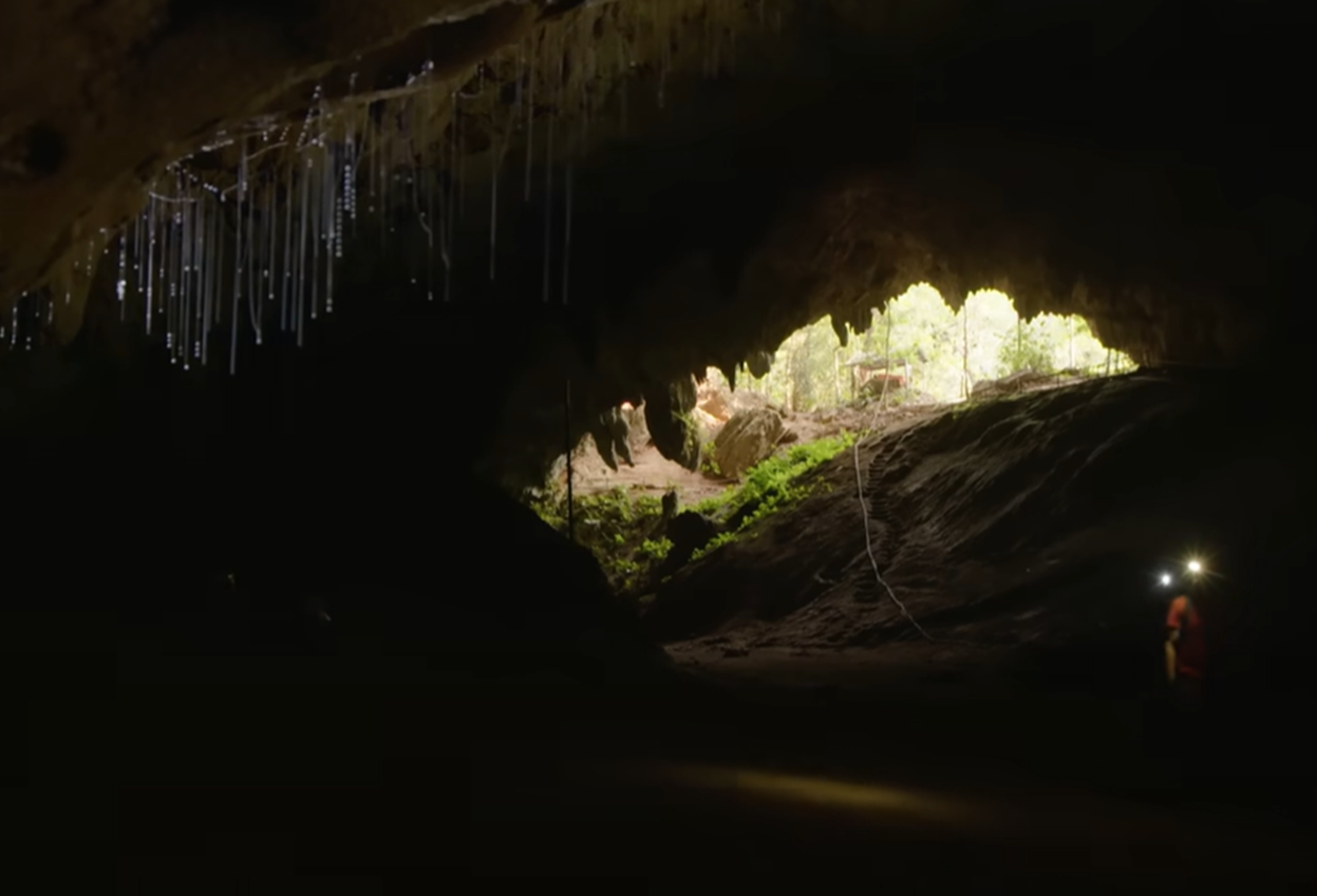 Screenshot of people in the cave - from Thai Cave Rescue (Drain the Oceans) 2019