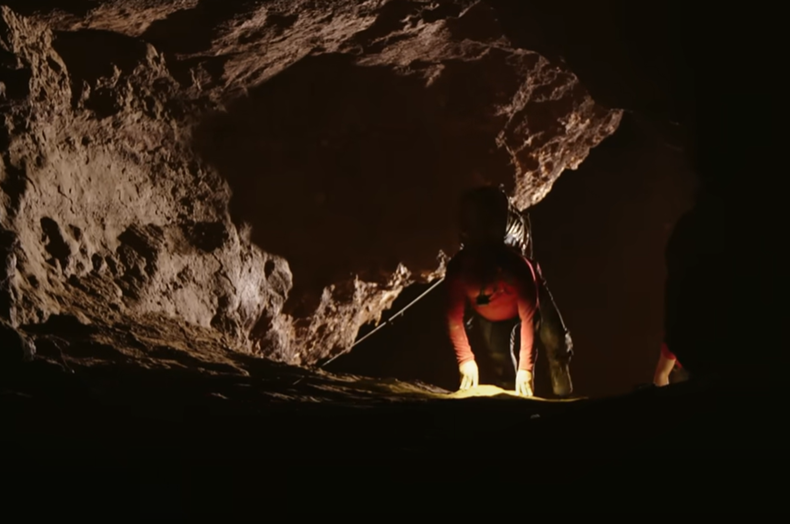 Screenshot of rescue divers in the cave - from Thai Cave Rescue (Drain the Oceans) 2019