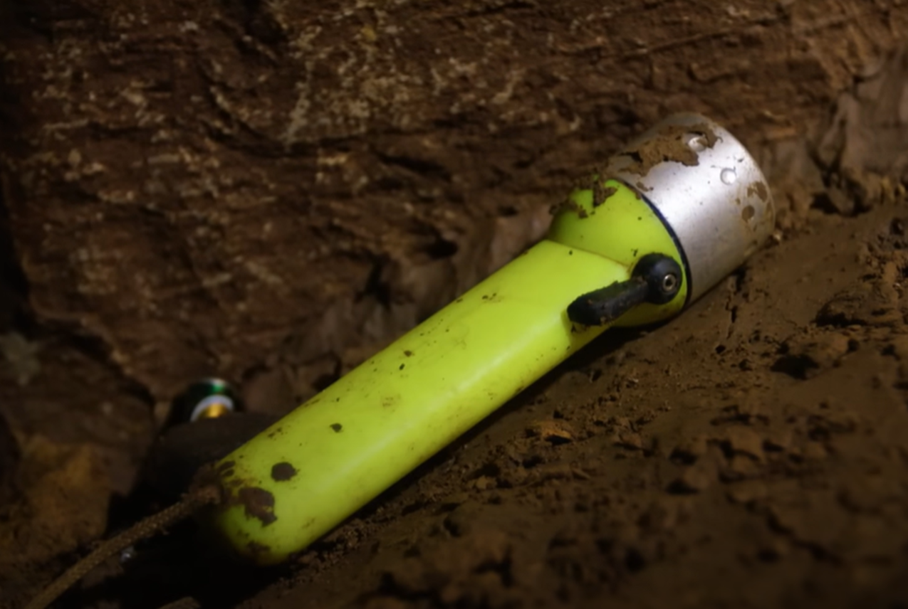 Screenshot of torch - from Thai Cave Rescue (Drain the Oceans) 2019