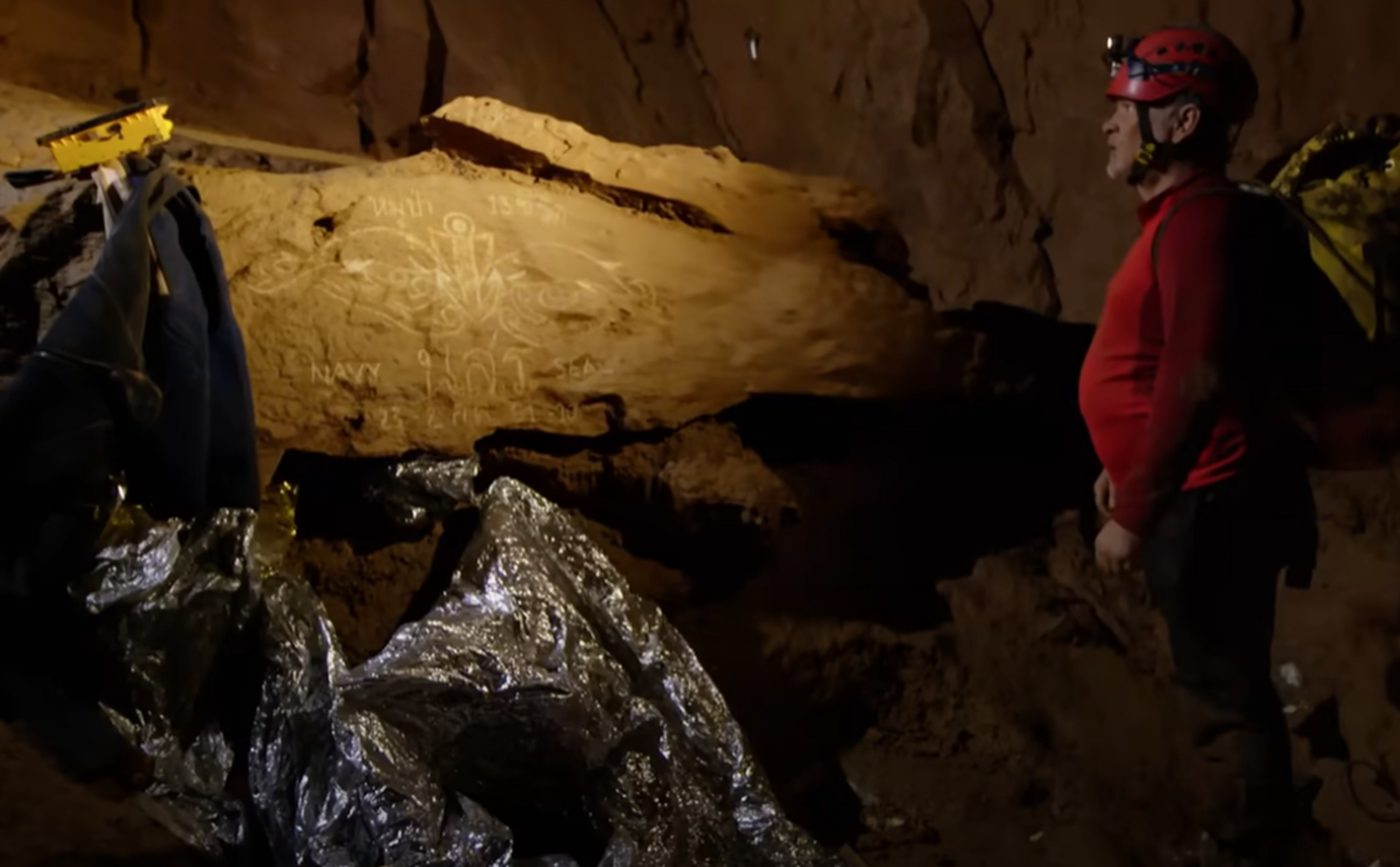 Screenshot of people in the cave - from Thai Cave Rescue (Drain the Oceans) 2019