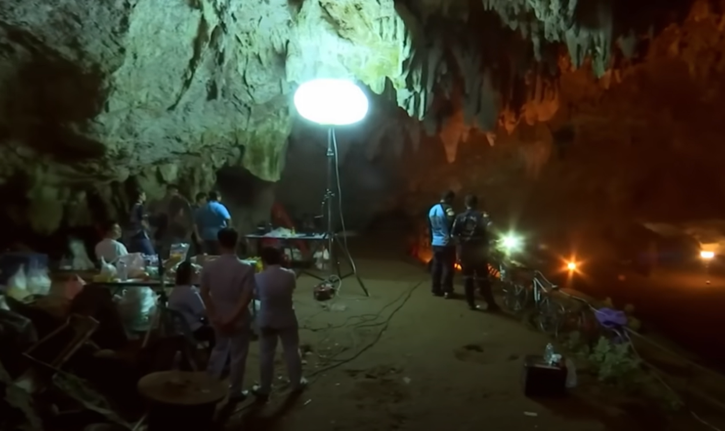 Screenshot of rescue divers in the cave - from Thai Cave Rescue (Drain the Oceans) 2019