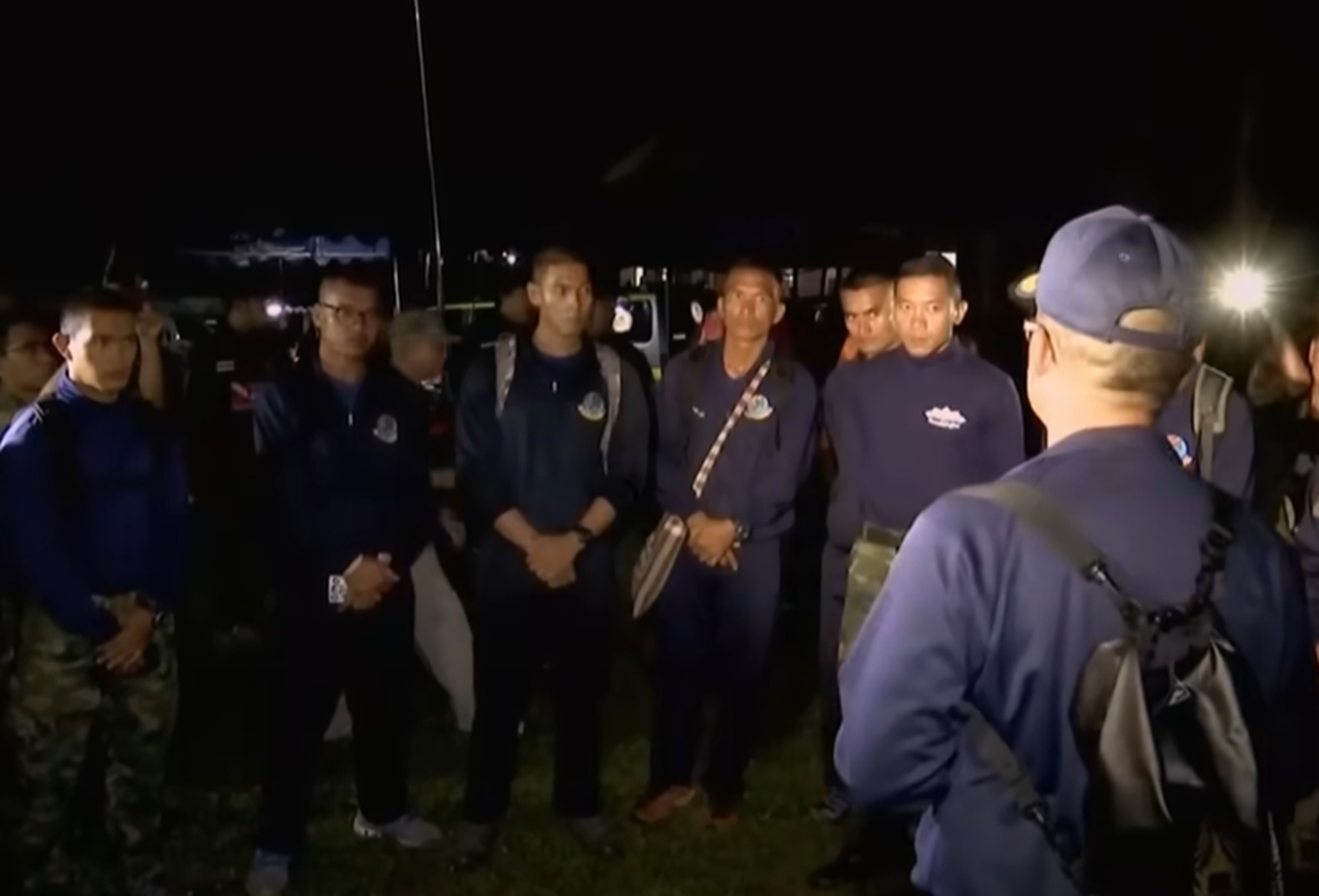 Screenshot of people outside the cave - from Thai Cave Rescue (Drain the Oceans) 2019