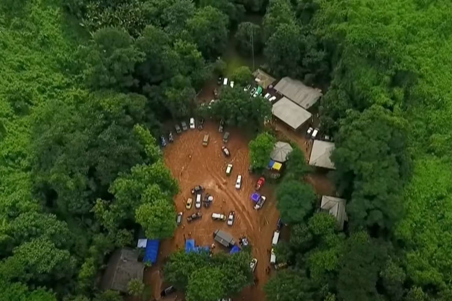 Screenshot of people outside the cave - from Thai Cave Rescue (Drain the Oceans) 2019