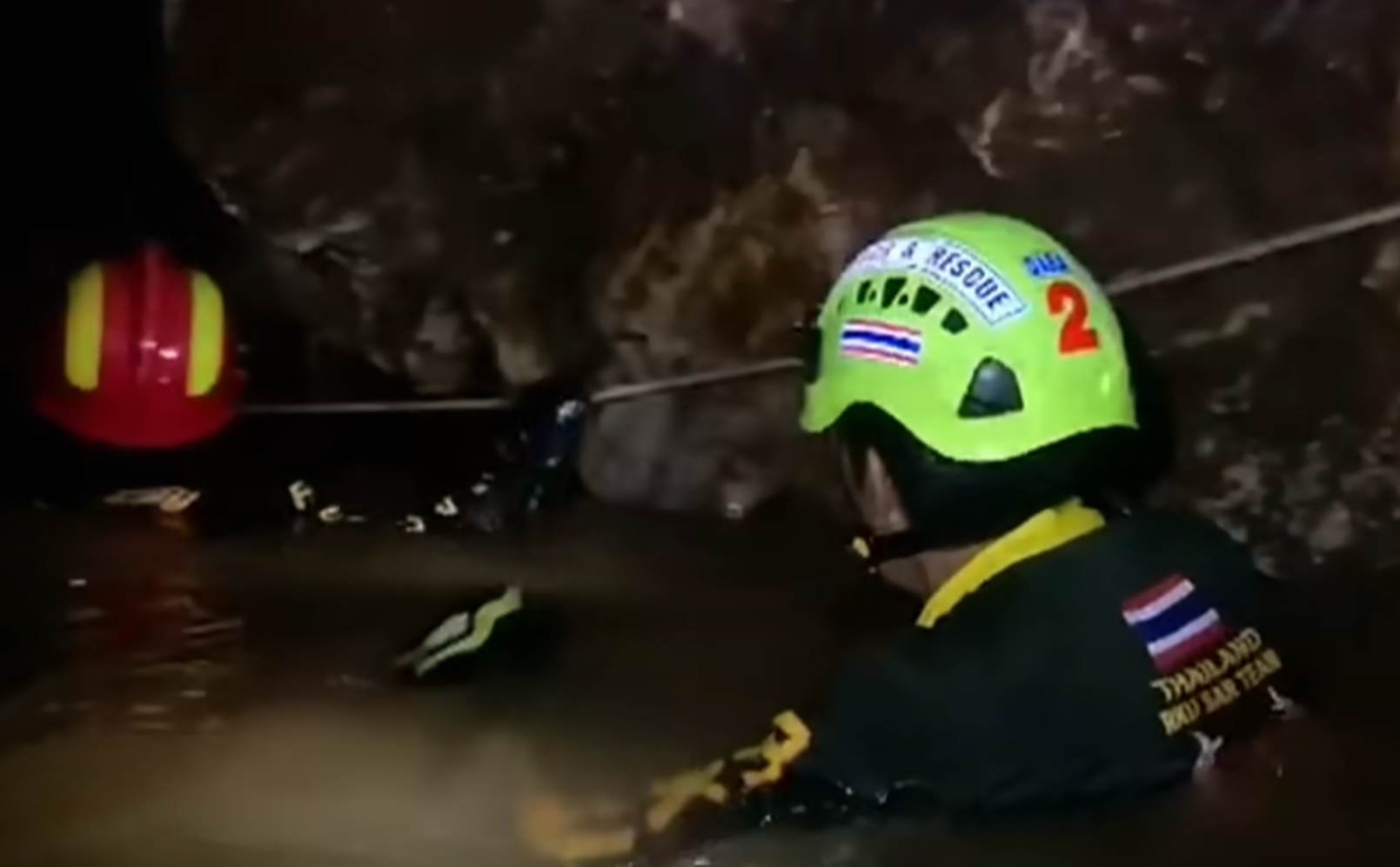 Screenshot of rescue divers in the cave - from Thai Cave Rescue (Drain the Oceans) 2019
