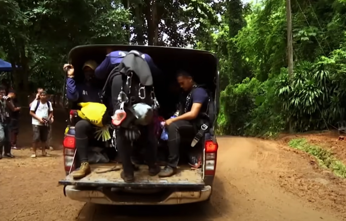 Screenshot of people outside the cave - from Thai Cave Rescue (Drain the Oceans) 2019