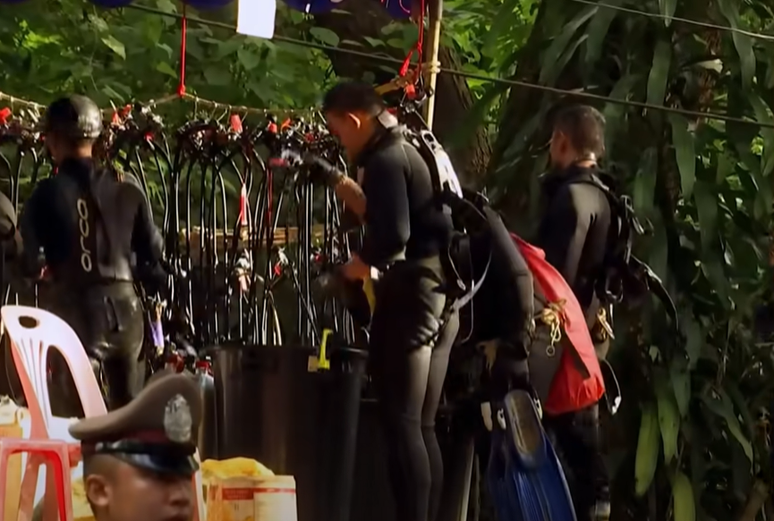 Screenshot of people outside the cave - from Thai Cave Rescue (Drain the Oceans) 2019