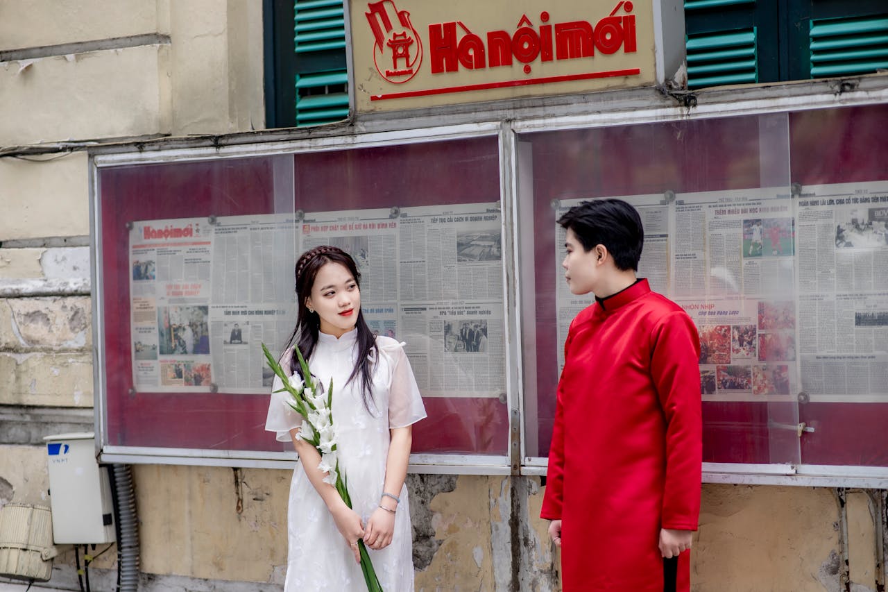 Couple in Asia on a Bus Stop