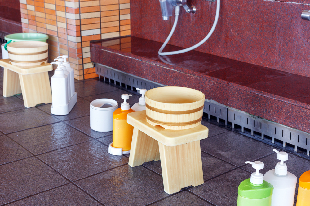 Bathing items in Japanese traditional style public shower bathroom