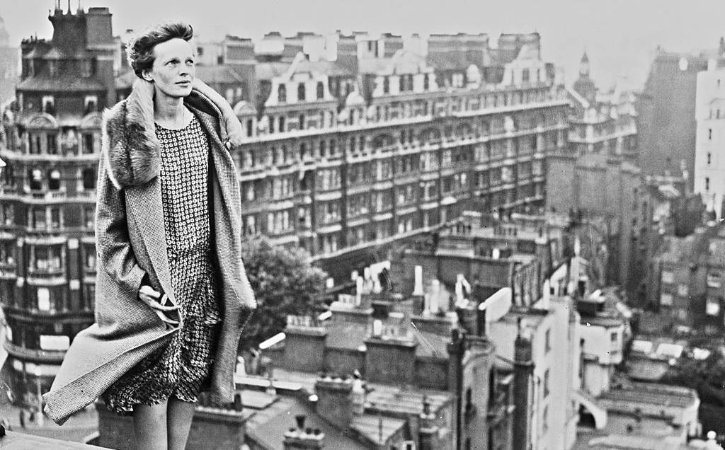 Amelia Earhart Standing on Roof