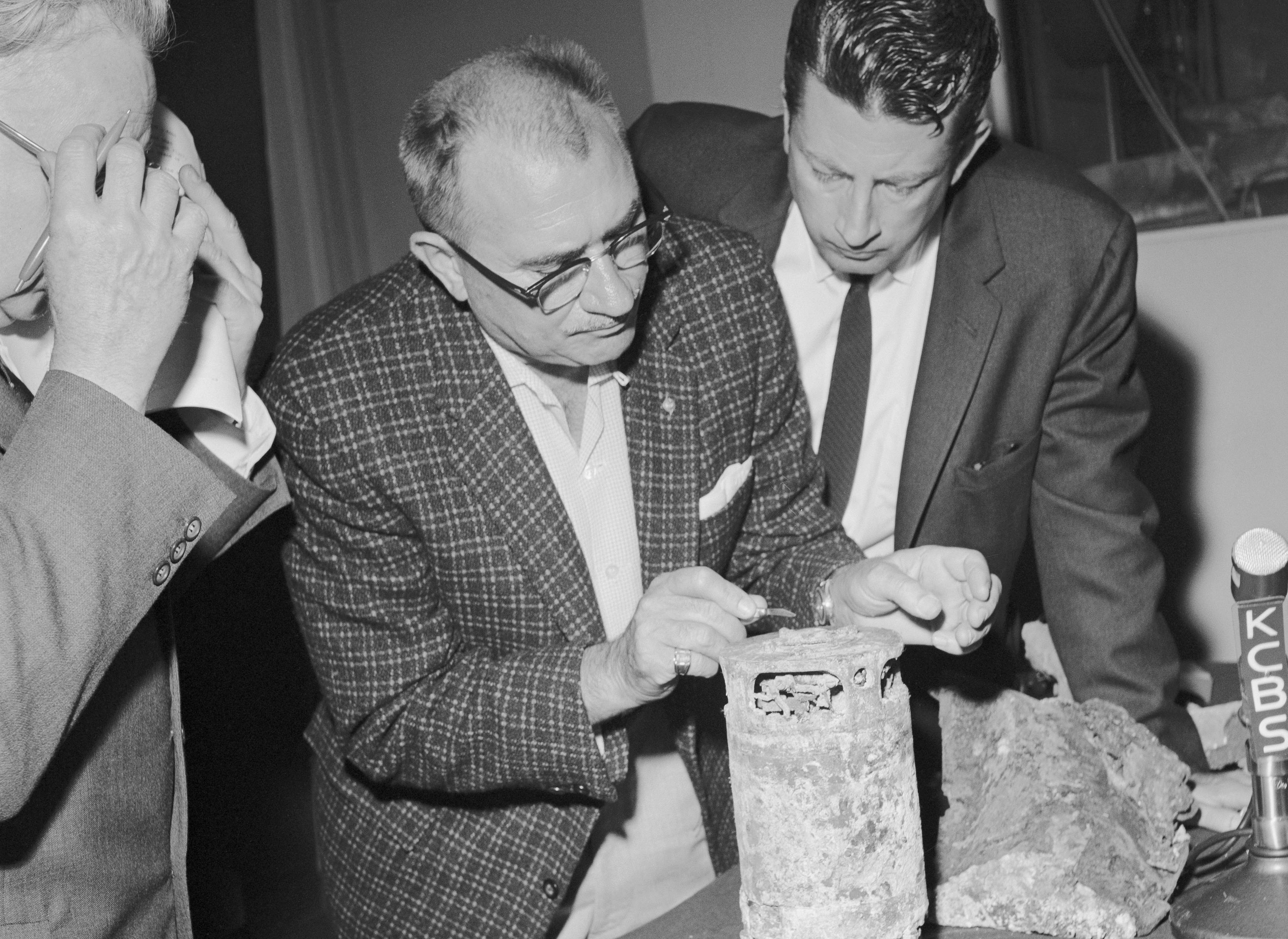 Fred Goerner and Paul Mantz Inspecting Generator