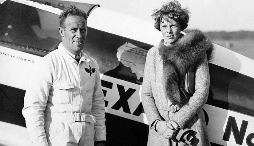 Amelia Earhart Putnam Posing with Captain Frank Hawks