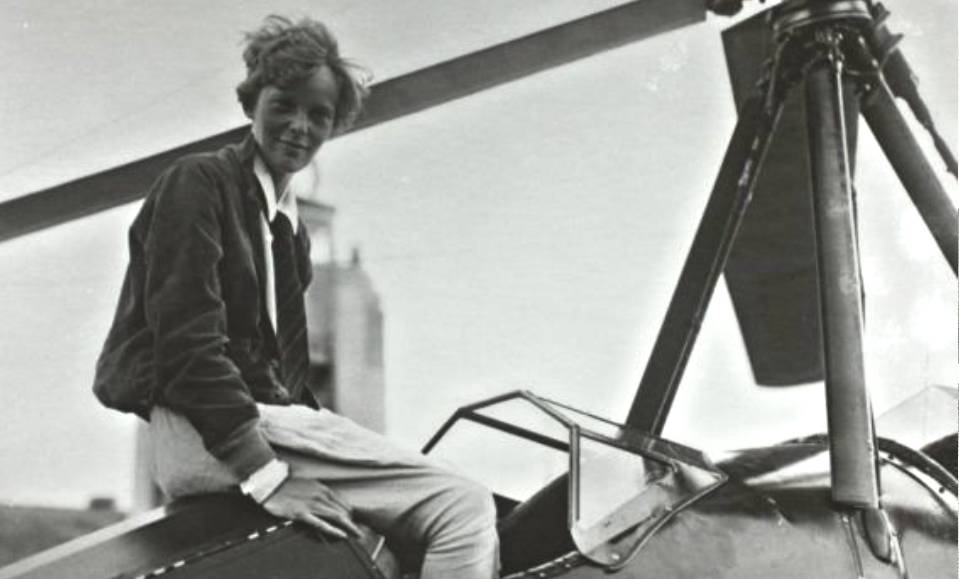 Amelia Earhart sitting on a plane