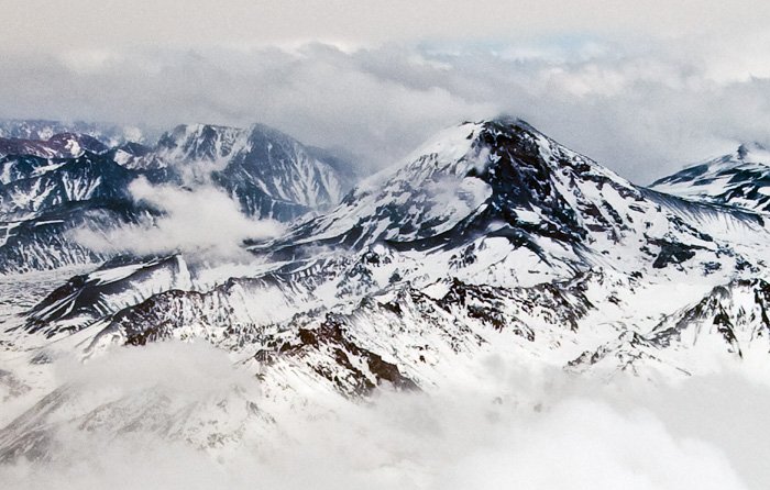 Areal view on the Tupungato (cone, center-left) and Tupungatito (flat, center-right) volcanoes