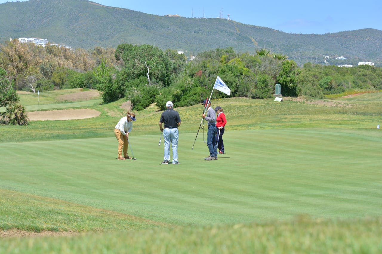 A Group of People Playing Golf