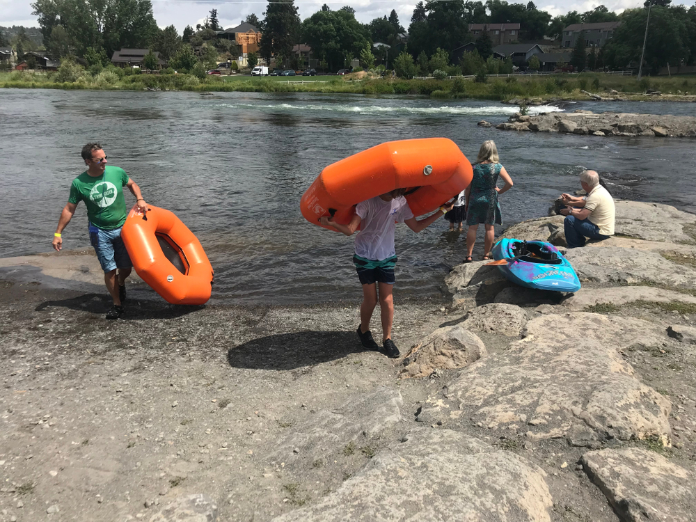 tubing on the Deschutes river through Bend, Oregon on a bright summer day - 2019