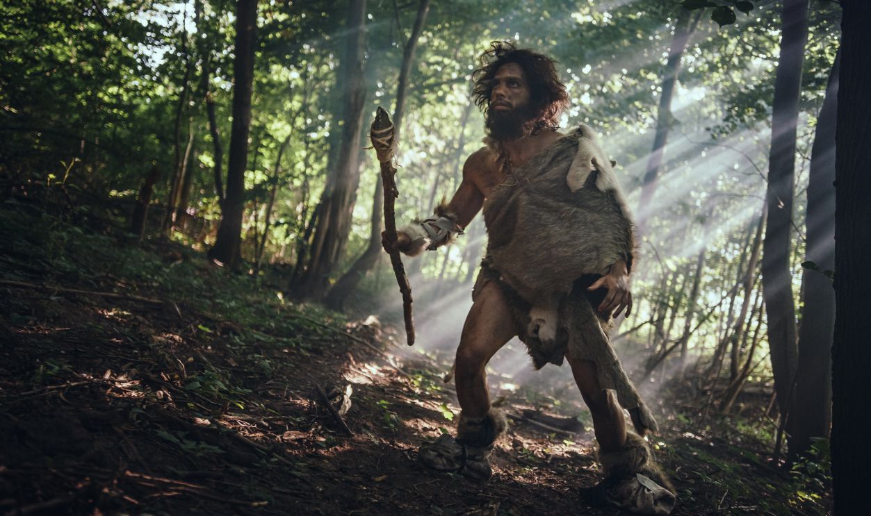 caveman on hunting