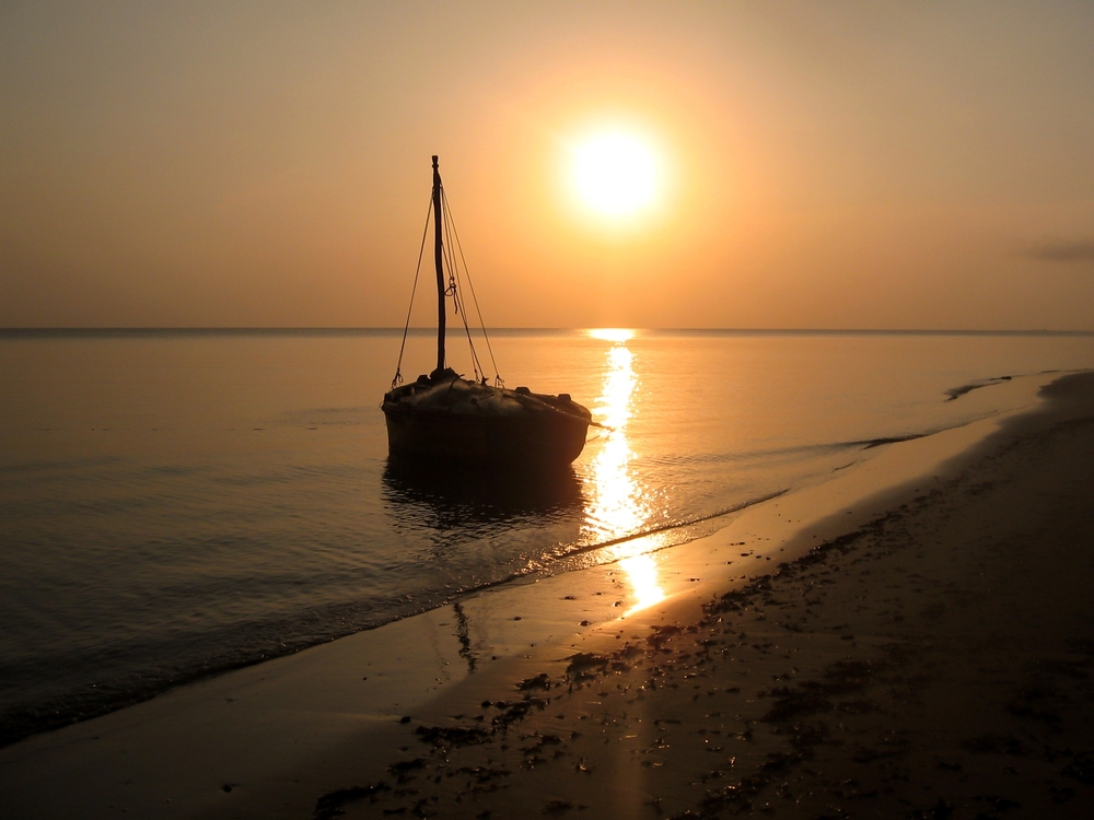 fishing boat at sunset