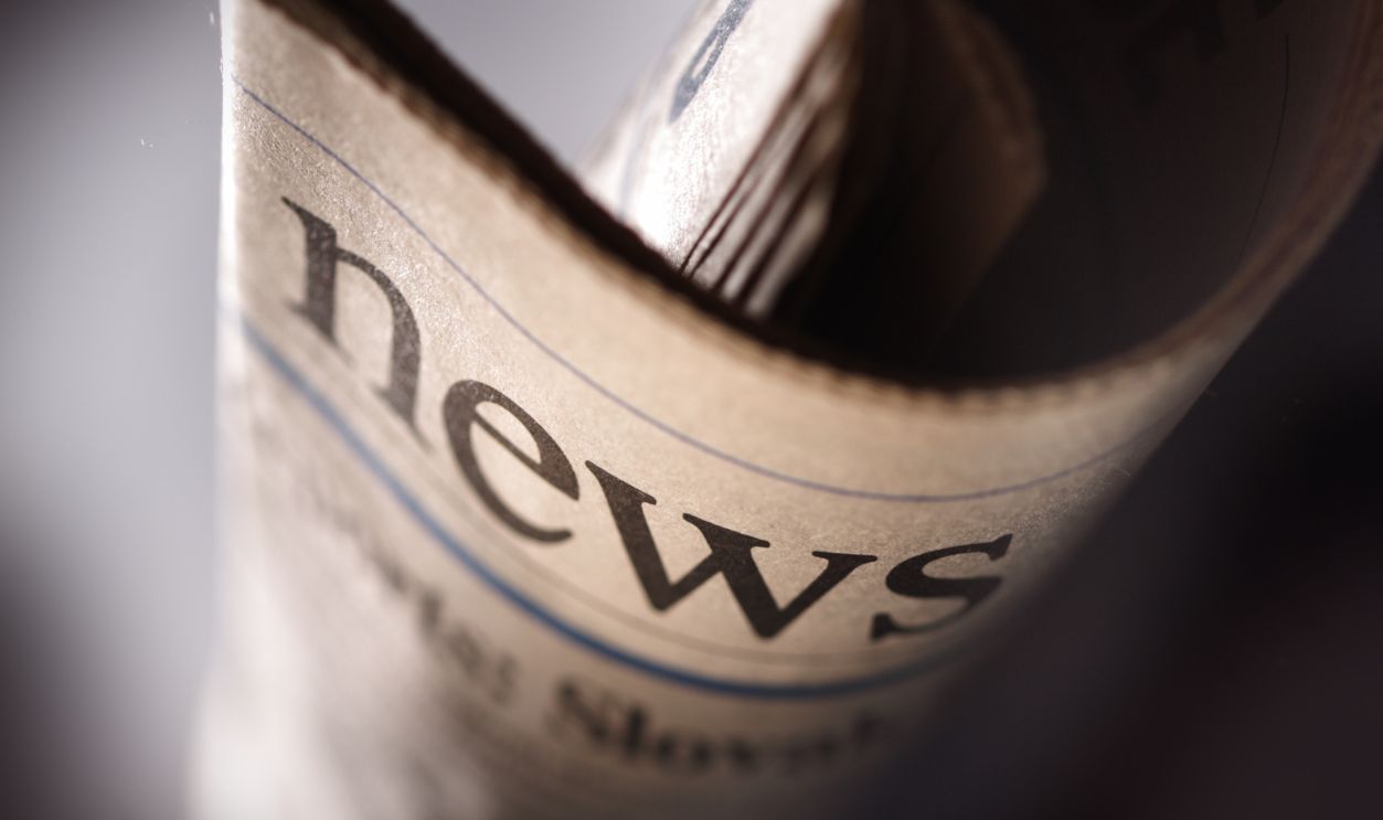 newspaper title on black background