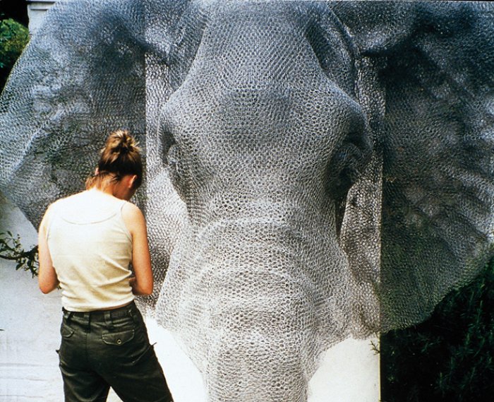 Kendra Haste working on her elephant sculpture in 1999.