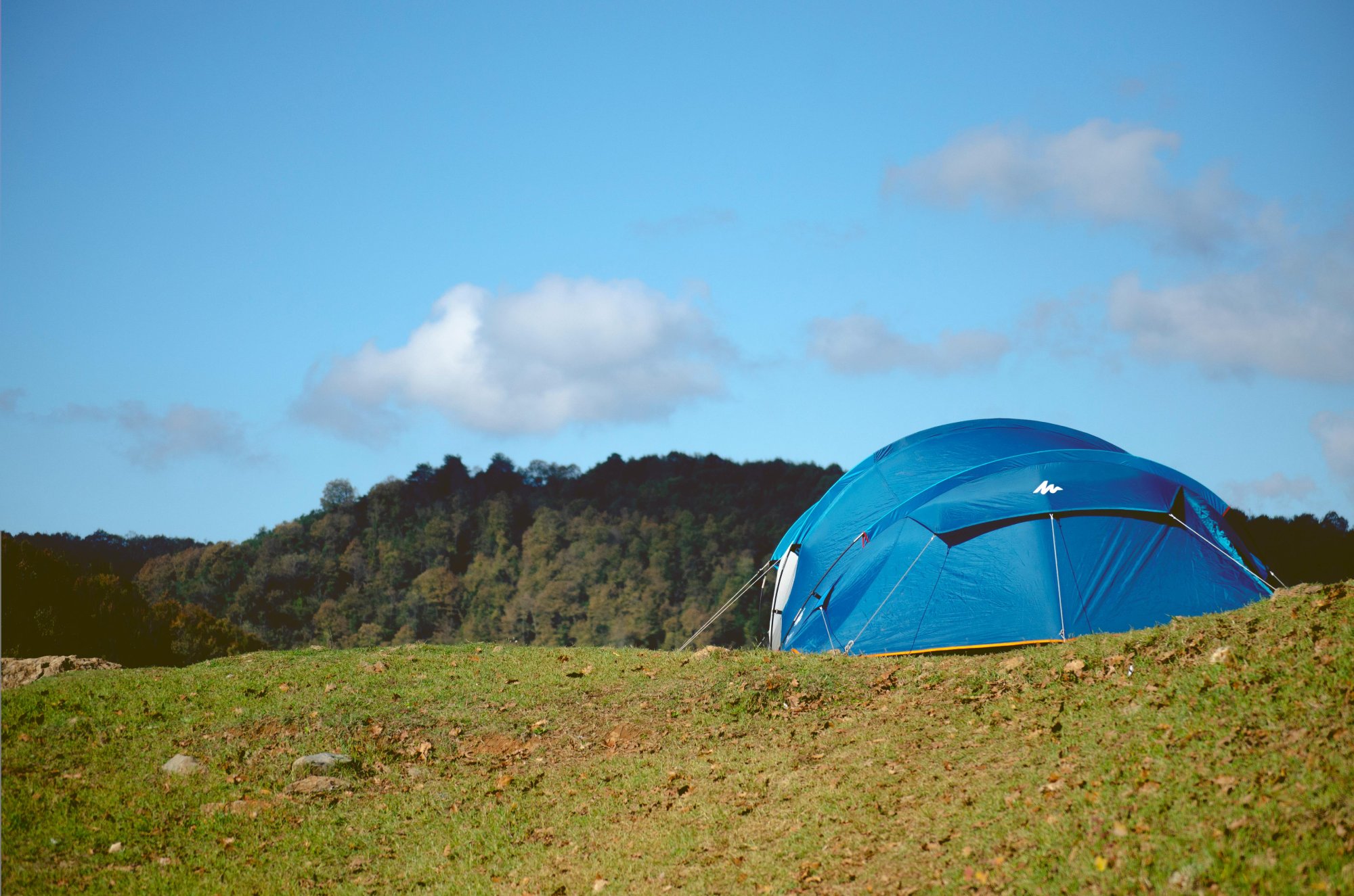 Blue tent on mountain