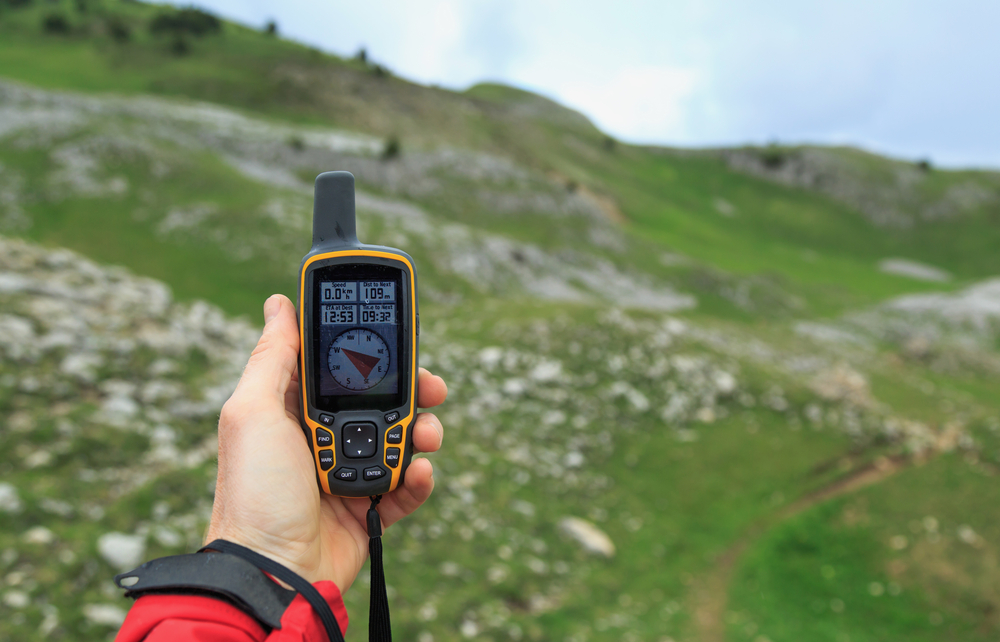 Man is holding GPS