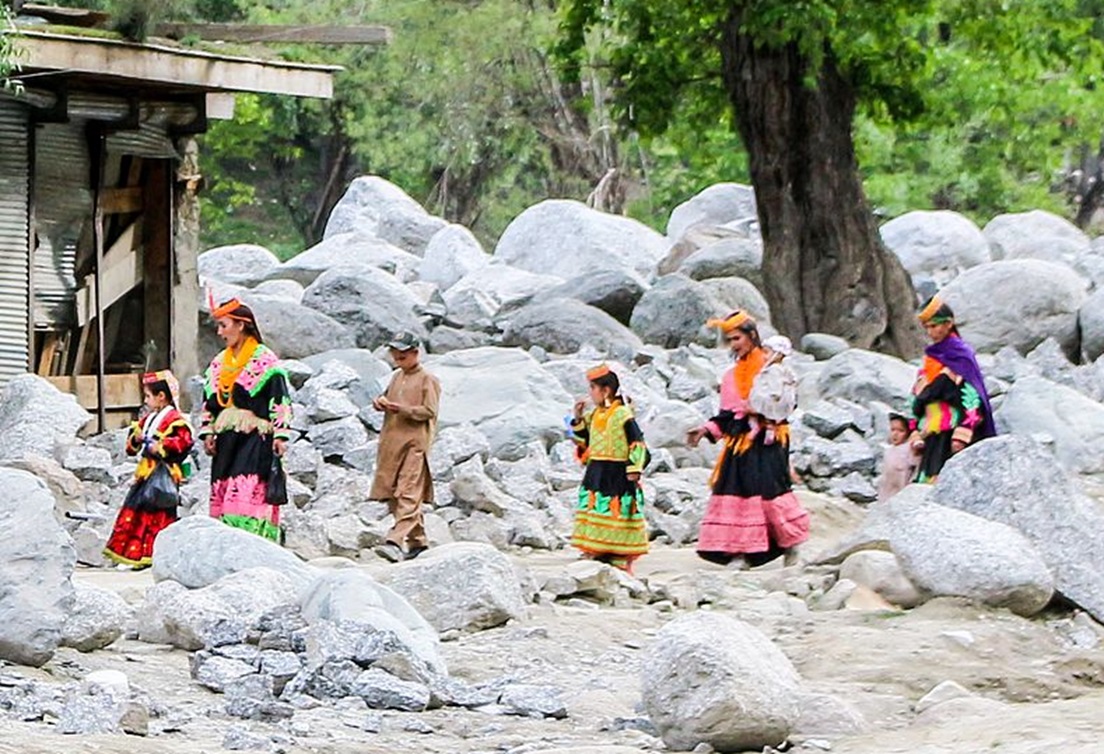 A Kalashi Family going to attend the Chillam Joshi Festival, Bumburet, Kalash Valley, Pakistan - 2016