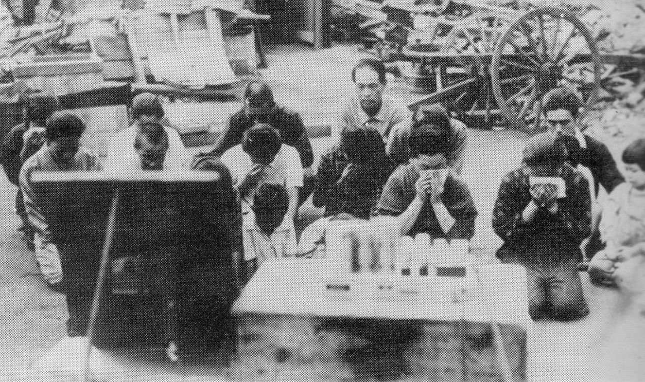 Japanese_civilians_listening_to_the_surrender_broadcast
