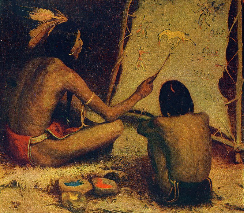 Indian Artist is painting in sign language