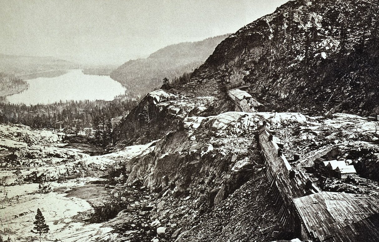 Summit of Sierra Nevada - snow sheds in foreground, Donner Lake in the distance
