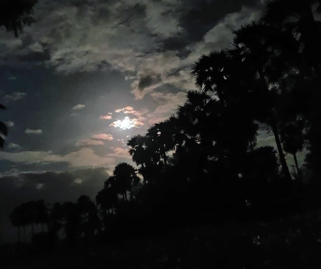 Moon Light though the clouds