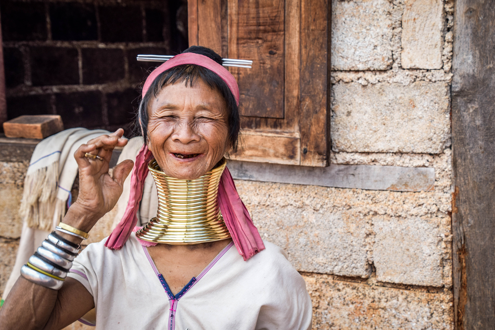 Woman of Kayan or “Long Neck Karen” ethic group smiling.