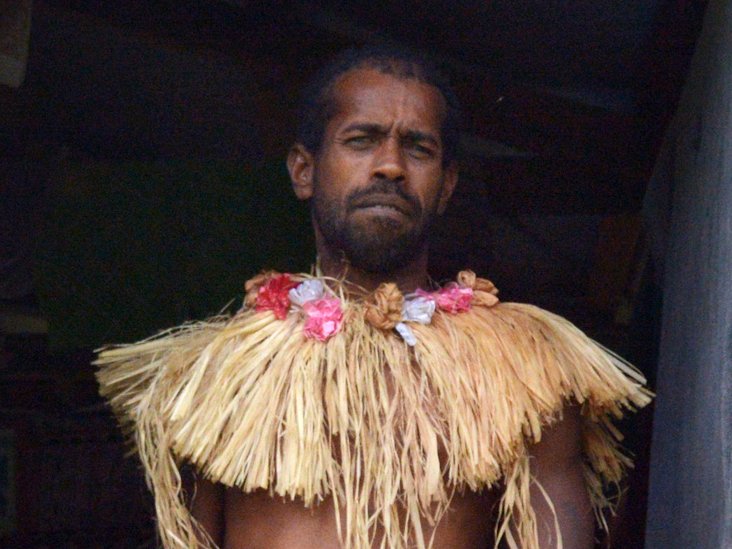 Portrait Photo of Indigenous Fijian man dressed in traditional Fijian costume