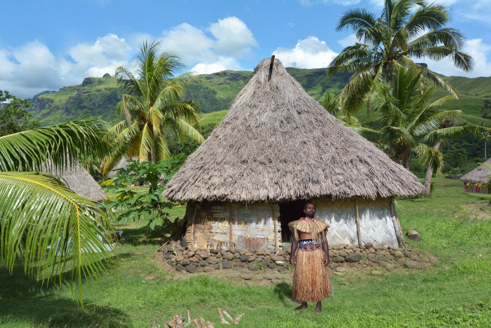 Portrait Photo of Indigenous Fijian man dressed in traditional Fijian costume