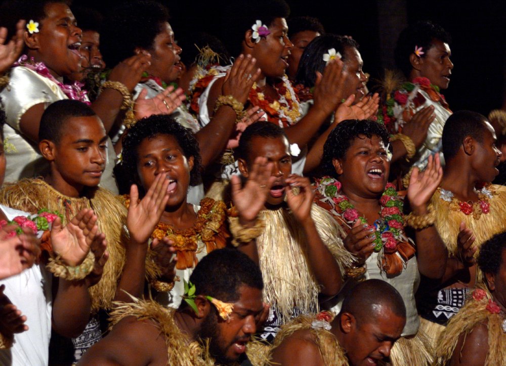 Portrait Photo of Indigenous Fijian people sing and dance in Fiji
