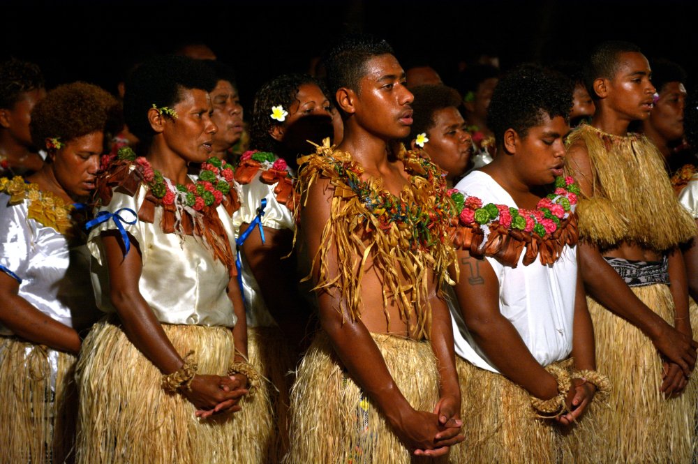 Portrait Photo of Indigenous Fijian people sing and dance in Fiji