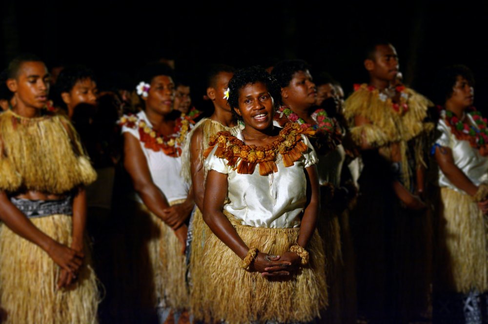 Portrait Photo of Indigenous Fijian people sing and dance in Fiji