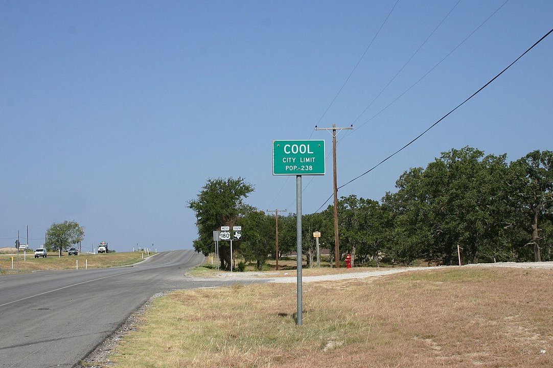 Green Highway Sign of Cool In Texas